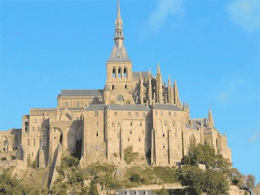 Experience the breathtaking beauty of Mont Saint-Michel on a day trip from Paris. This guide covers transportation options, must-see sights, and tips for making the most of your visit to this iconic island commune, famous for its stunning abbey and picturesque views