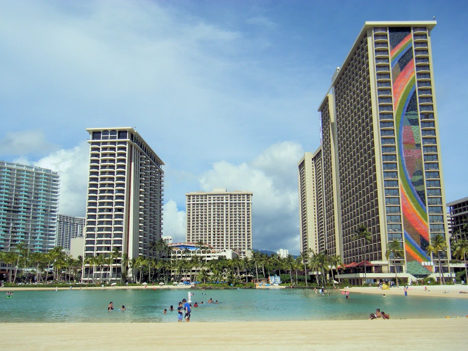 Our review of the Hilton Hawaiian Village, Waikiki’s iconic beachfront resort. Explore details on rooms, dining, amenities, and nearby attractions to help you plan your perfect Hawaiian getaway