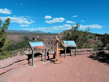 Explore cliff dwellings & hike through ancient history at Bandelier National Monument, NM. Unique multi-story homes & stunning Frijoles Canyon views. Ranger tours, wildlife & Jemez Mt beauty await!