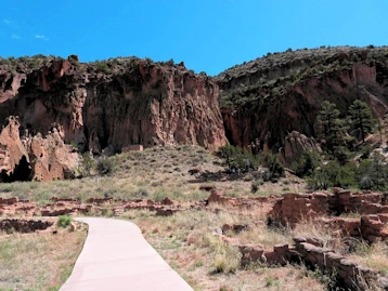 Explore cliff dwellings & hike through ancient history at Bandelier National Monument, NM. Unique multi-story homes & stunning Frijoles Canyon views. Ranger tours, wildlife & Jemez Mt beauty await!