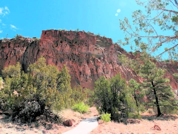 Explore cliff dwellings & hike through ancient history at Bandelier National Monument, NM. Unique multi-story homes & stunning Frijoles Canyon views. Ranger tours, wildlife & Jemez Mt beauty await!