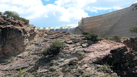 Explore Nambe Falls, a stunning 120-foot waterfall located just 16 miles from Santa Fe. Discover two scenic hiking trails—one leading to the top for panoramic views and the other to the base for a closer look. Experience the natural beauty and cultural significance of this Nambe Pueblo treasure