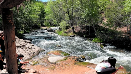 Explore Nambe Falls, a stunning 120-foot waterfall located just 16 miles from Santa Fe. Discover two scenic hiking trails—one leading to the top for panoramic views and the other to the base for a closer look. Experience the natural beauty and cultural significance of this Nambe Pueblo treasure