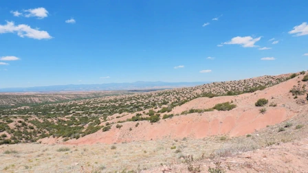 Explore Nambe Falls, a stunning 120-foot waterfall located just 16 miles from Santa Fe. Discover two scenic hiking trails—one leading to the top for panoramic views and the other to the base for a closer look. Experience the natural beauty and cultural significance of this Nambe Pueblo treasure