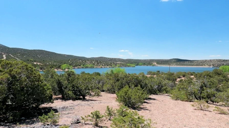 Explore Nambe Falls, a stunning 120-foot waterfall located just 16 miles from Santa Fe. Discover two scenic hiking trails—one leading to the top for panoramic views and the other to the base for a closer look. Experience the natural beauty and cultural significance of this Nambe Pueblo treasure